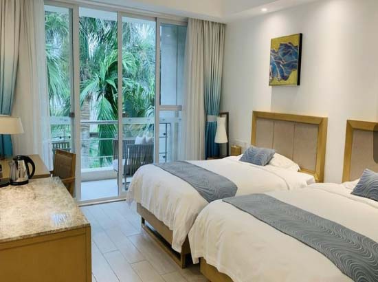 琼海博鳌亚洲论坛金海岸温泉大酒店棕榈岛园景双床房